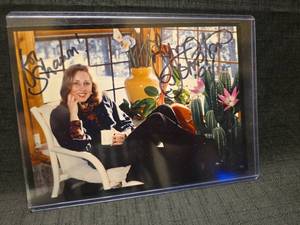 lot 50998 image: Signed Celebrity Photo in Plastic Sleeve