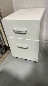 lot 30 image: White 2-Drawer Mobile Pedestal Nightstand with Casters