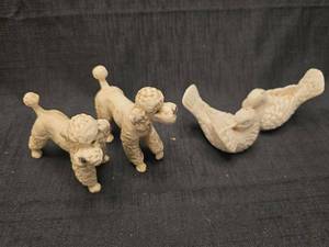 lot 40231 image: Ceramic Poodle Dog and Bird salt and pepper shaker Set