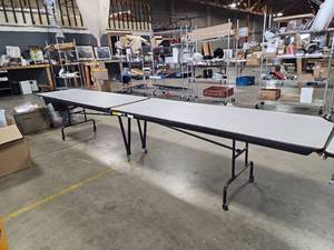 lot 29637 image: Folding Banquet Table with Gray Laminate Top and Casters 14ft