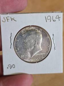 lot 31 image: 1964 JFK silver half dollar