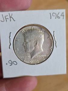lot 32 image: 1964 JFK silver half dollar