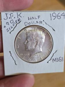 lot 33 image: 1964 MS63 JFK silver half dollar