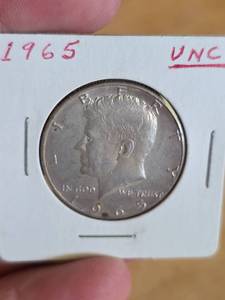 lot 34 image: 1965 UNC JFK silver half dollar