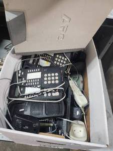 lot 1 image: Box of used multi line business phones