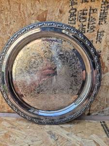 lot 330 image: Round Silver-Tone Serving Tray with Engraved Floral Center and Embossed Border