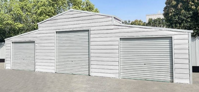 lot 6582 image: Unused KJ 42ft x 30ft Metal Barn - Storage Shed  Model K4230W  3 Rolling Doors - 1 Side Entry Door - 1 Sliding Window