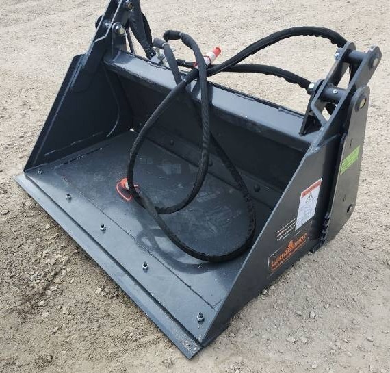 lot 3089 image: Unused LandHonor Heavy-Duty 44 4-In-1 Combo Mini Skid Steer Bucket  MCB-72-44W  Combines digging, grading, grabbing, and dozing in one versatile attachment.