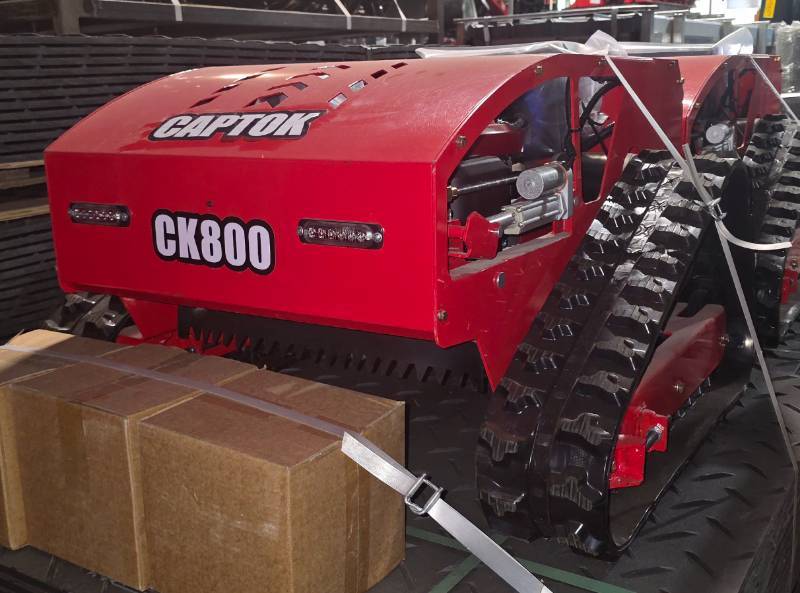 lot 8270 image: Unused Captok Remote-Control Crawler LawnSlope Mower CK-800 - Engineered for Efficient & Safe Mowing on Steep Slopes, Uneven Terrain and Under Machinery, Brush & Vehicles