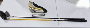 lot 718 image: Dymo Golf STR8-FIT driver head with headcover and wrench 10.5 Loft. TaylorMade driver shows Tour Burner Plus 9.5 Loft