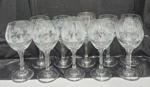 lot 768 image: Set of 8 (Plus 2) Etched Winter Scene Wine Glasses with Gold Rim