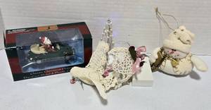 lot 784 image: Maisto VW Bug with Santa & Rudolph, Mini Lighted Tree (Works) and other hand made Ornaments