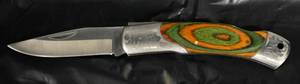 lot 866 image: Super Knife Folding Knife Stainless Steel Blade Green Orange Handle