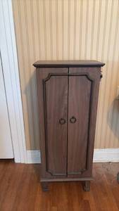 lot 104 image: Hives Honey Brand- Locking Two-Door Jewelry Cabinet with 6 Drawers 38 Inches Tall 10.5 Deep and 15 Wide with Doors Closed