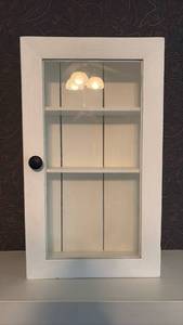 lot 138 image: White Glass-Front Wall Cabinet Approximately 23.5 Inches Tall 4.75 Inches Deep 13.5 Wide, Hanging Hardware Attached