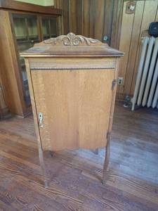 lot 159 image: Wood Cabinet with Carved Top, Single Door and Interior Shelves