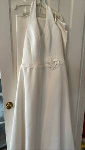 lot 183 image: Halter Top Ivory Matte Satin With Chapel Train and Flower Detail at the Waist. WDS 14W Includes Matching Satin Wrap and Multi Layer Curly Edge Veil.