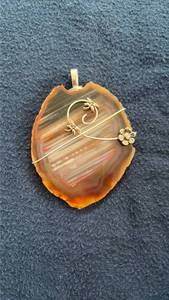 lot 301 image: Polished Geological Stone Pendant