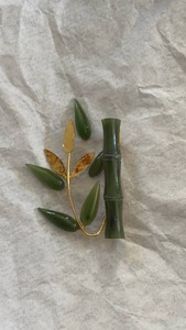 lot 309 image: Green Stone & Gold-Tone Metal Leaf Branch Brooch and Bamboo Figurine Lot Needs Reglued