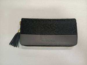 lot 8377 image: Pomelo Best black long wallet features a honeycomb texture and a matching tassel.
