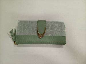 lot 10555 image: Pomelo Best long wallet in light green featuring a honeycomb pattern and gold-tone metal accent.
