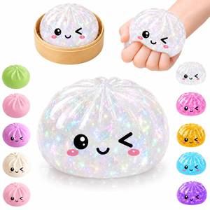 lot 28519 image: Mystery Glitter Dumpling Squishy Pack with Steamer Box �� Soft Bao Bun Stress Ball, Sensory Fidget Squeeze Toy for Stress & Anxiety Relief, Stretchy Desk Toy Gift for Kids, Teens & Adults,Glitter White - Retail $13