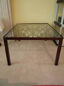 lot 912 image: Square Iron Table with Glass Top with Iron Scroll.  Very Heavy  19 x 31 x 40