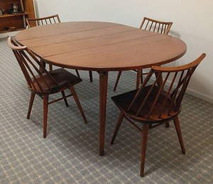 Conant Ball 1950s birch dining table with 4 spindle back chairs from the Modern Mates line designed by Leslie Diamond 30 x 72 x 48 which includes 2 12 in leaves