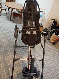 lot 933 image: Teeter Inversion Table.   Located in basement