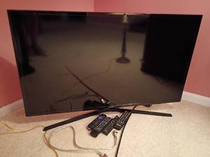 lot 939 image: 40in Samsung Television with Remote.   Located upstairs