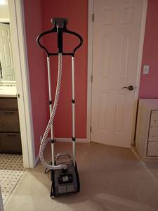 lot 948 image: Rowenta Clothes Steamer.  64in tall.  Located upstairs