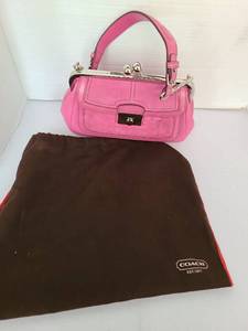 lot 1025 image: Coach Pink Handbag with Frame Handle and Dust Bag