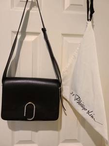 lot 1027 image: 3.1 Phillip Lim Black Shoulder Bag with Metal Hardware, includes dust cover bag