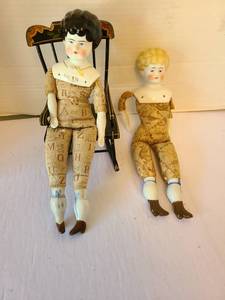 lot 1046 image: 2 Porcelain Dolls with Alphabet Patterned Clothing and Rocking Chair