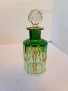 lot 1066 image: Tall, green art nouveau baccarat style crystal bottle with fine gold ribbon decoration.