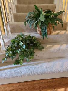 lot 1143 image: Faux greenery arrangements in baskets. 17 in
