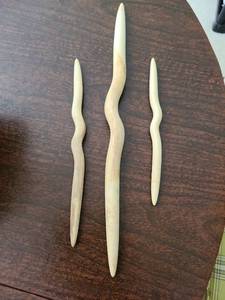 lot 1160 image: 3 sanded ceramic sticks, longest is 18in.