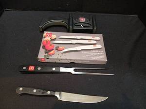 lot 1208 image: Wusthof Knives with sharpener and serving fork
