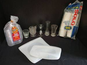 lot 1211 image: Tableware Lot  Shot Glasses  with disposable  cups and reusable bags