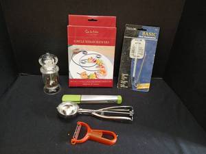 lot 1212 image: Kitchen Gadgets Lot Kebab Skewers, Meat Thermometer, Utensils, Peeler
