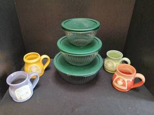 lot 1216 image: Pyrex Nesting Bowls with Lids and Ceramic coffee mugs. large pyrex lid in last picture sliver  of rim is peeled off.