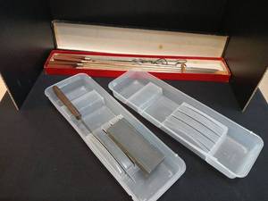 lot 1219 image: Long Japanese skewers, sharpening stone, carving knife, 2 plastic knife holders
