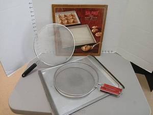lot 1241 image: Silpat Non-Stick Cookie Sheet Liners, cookie sheets , and Bombay splatter screens.
