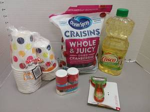 lot 1251 image: Kitchen Pantry & Supplies Lot Crisco Canola Oil, Ocean Spray Craisins, Market Pantry Salt & Pepper, Solo Cups, Peeler Set