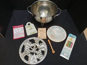 lot 1309 image: Kitchen Gadget Lot Colander Bread Warmer Plate small grater