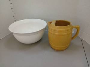 lot 1357 image: Vintage stoneware yellow pitcher. The white bowl has chips