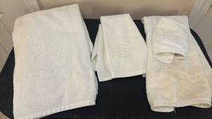 lot 1461 image: Towels Set with S on them. Some staining