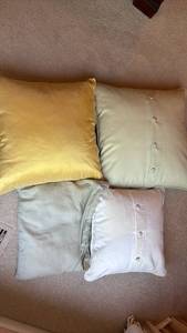 lot 1473 image: Throw Pillows Set of 4 with Button Tufting some staining on white one