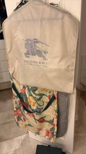 lot 1513 image: Burberry Garment Bag with Floral Print Dust Cover with Shoe hanger
