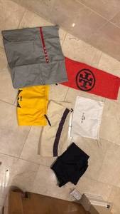 lot 1528 image: Designer Dust Bags and Pouches Lot Coach MCM Prada Tory Burch